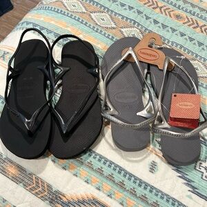 Black and silver flip-flops one pair $12. 2/24